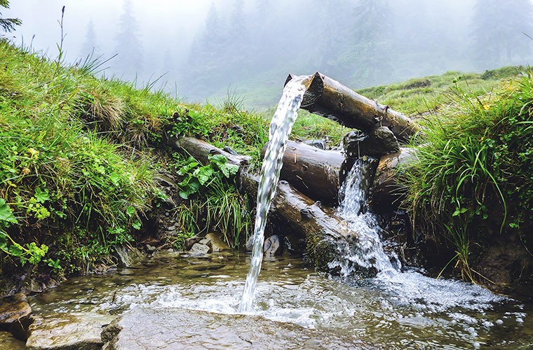 Groundwater pipe discharging water.