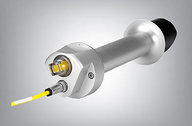 A Kipp & Zonen pryheliometer with a high quality connector shown in yellow and a screw-in drying cartridge containing a yellow dessicant.