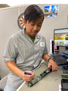 Person calibrating a HYDROLAB device