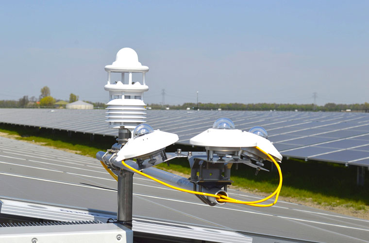 Environmental monitoring station on a PV plant including three Kipp & Zonen pyranometers, two soiling sensors Kipp & Zonen DustIQ, and a Luft WS600 compact weather station